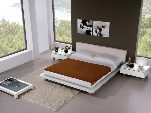 Letto in legno con testiera in tessuto imbottito Ada di Fratelli Elli