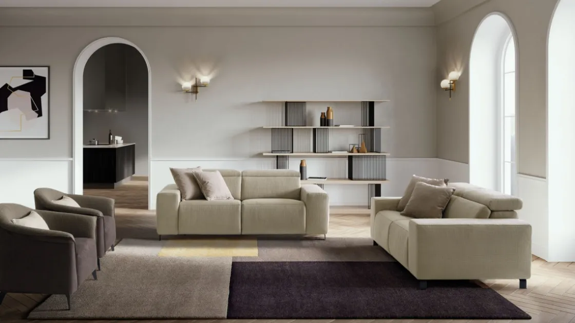 Divano lineare con movimento relax in tessuto Sebastian di Le Comfort